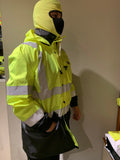 Waterproof hi-vis jacket back view with reflective stripe